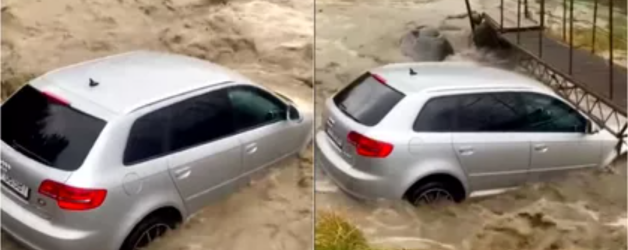 Audi A3 luat de viitură după ce șoferul a intrat în râu fără să se asigure la stânga și fără să tragă frâna de mână